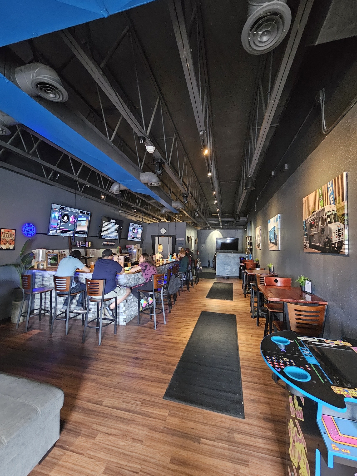 Kava Works Downtown lounge with guests seated at the bar for an alcohol-free night out